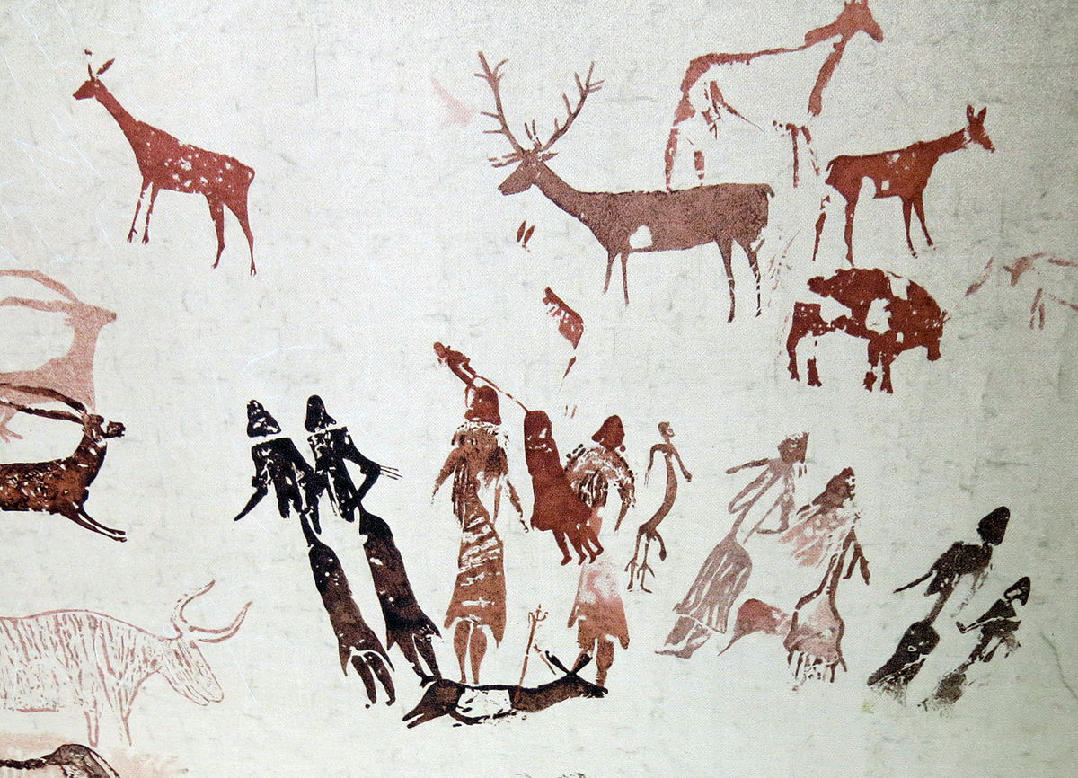 Pintura rupestre de un conjunto de figuras y animales de la Cueva de Cogull, Lleida