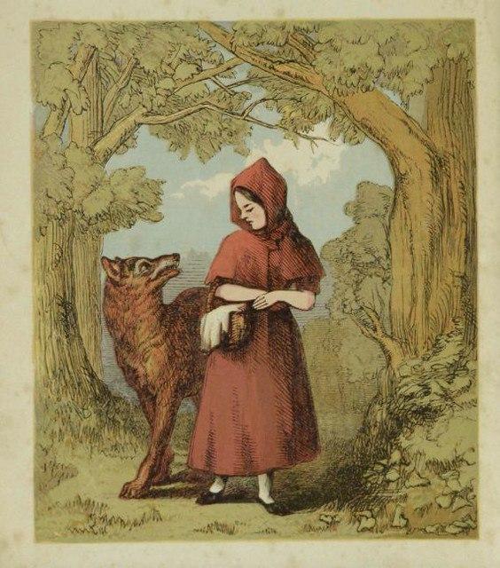 En la imagen puedes ver la portada del cuento de Caperucita Roja. Se puede ver a Caperucita Roja junto a un lobo en el bosque