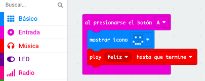 Código al presionar botón A que muestre cara feliz y haga un sonido feliz